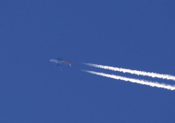 Taken against the sun Armavia EK-32007 Airbus A319 passes by.