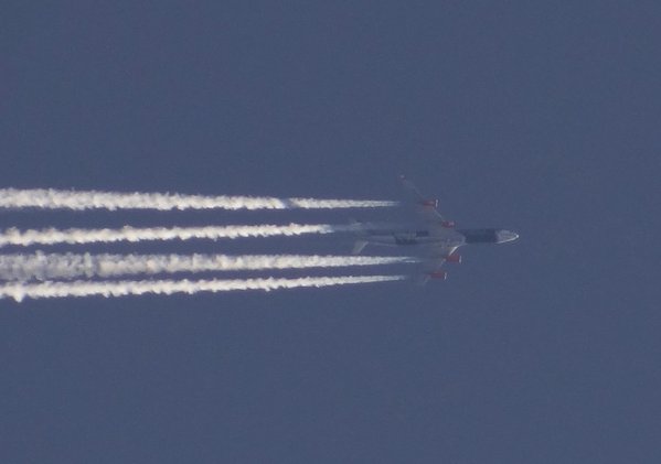 Unfortunately passing against the sun is Air Asia X A340 9M-XAC.