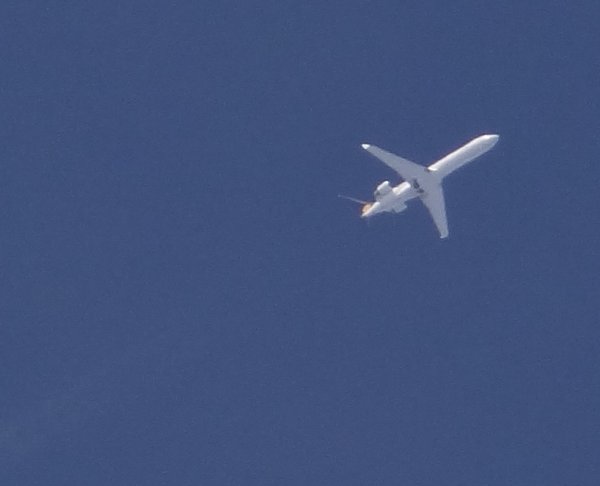 Lufthansa City Line CRJ 700. No registration under the wings, just a tiny one on the fuselage.