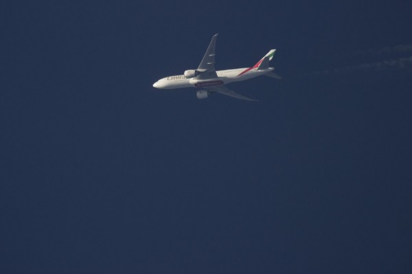 Emirates 772 (A6-EWH), flying at 33,000 ft from DXB to LYS