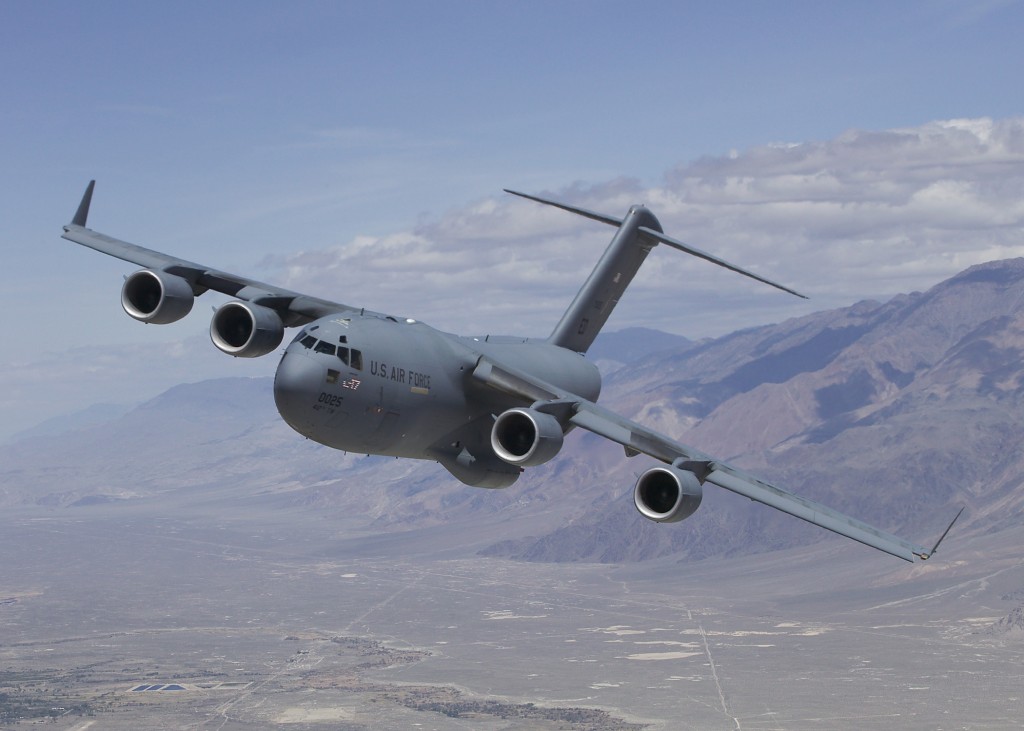 The C-17 Globemaster III T-1 flies over Owens Valley, Calif., for a test sortie. Edwards welcomed home the aircraft after 208 days of life extension modifications in San Antonio. T-1 is the first Air Force C-17 built to perform developmental testing. The aircraft is scheduled to perform flight testing to include airdrop improvements and core-computer replacement testing. (Air Force photo)