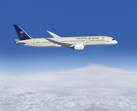 787-9; Saudia; 1st Delivery; air to air; left side of plane; above clouds; K66503