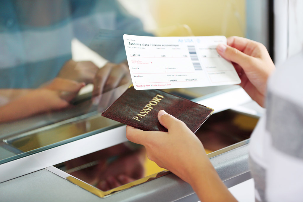 Airport Check-In Counters With Passengers