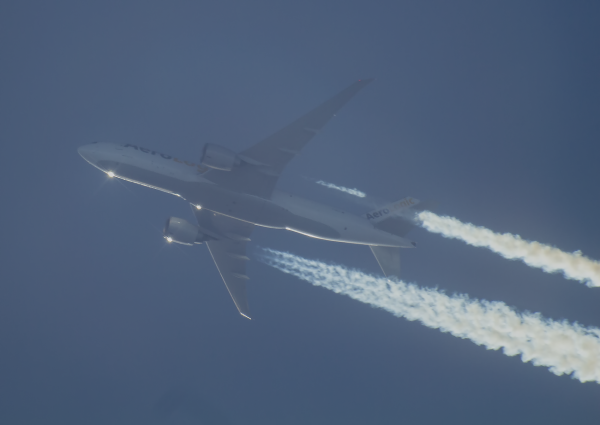 AEROLOGIC BOEING 777-F  D-AALD ROUTING CHICAGO--FRANKFURT AS BOX413    33,000FT.  INTO THE SUN.
