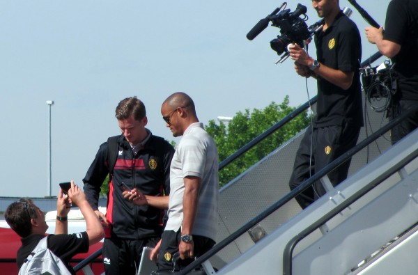 Team captain Vincent Kompany climbs on board