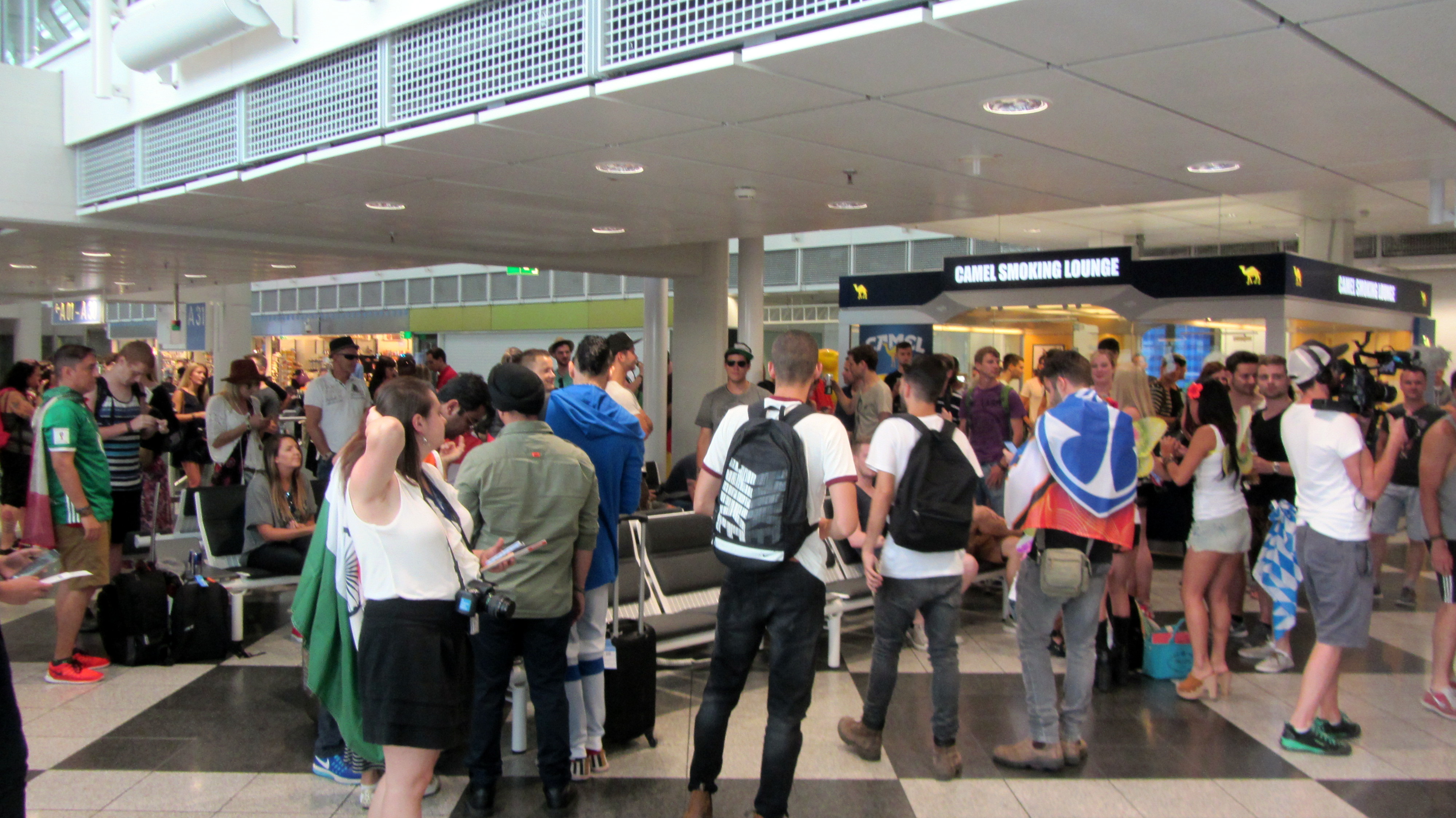 Large multinational crowd waiting to embark